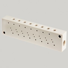 plastic-PEEK-manifold-with-threaded-holes